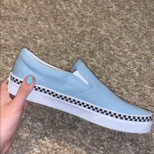 light blue vans :)